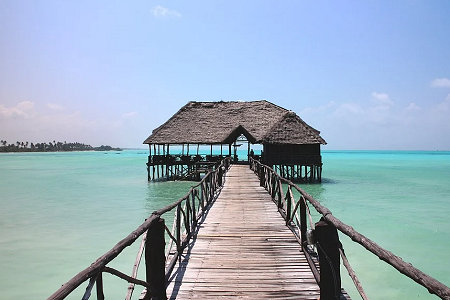 Beach hut on the end of a rickety pier